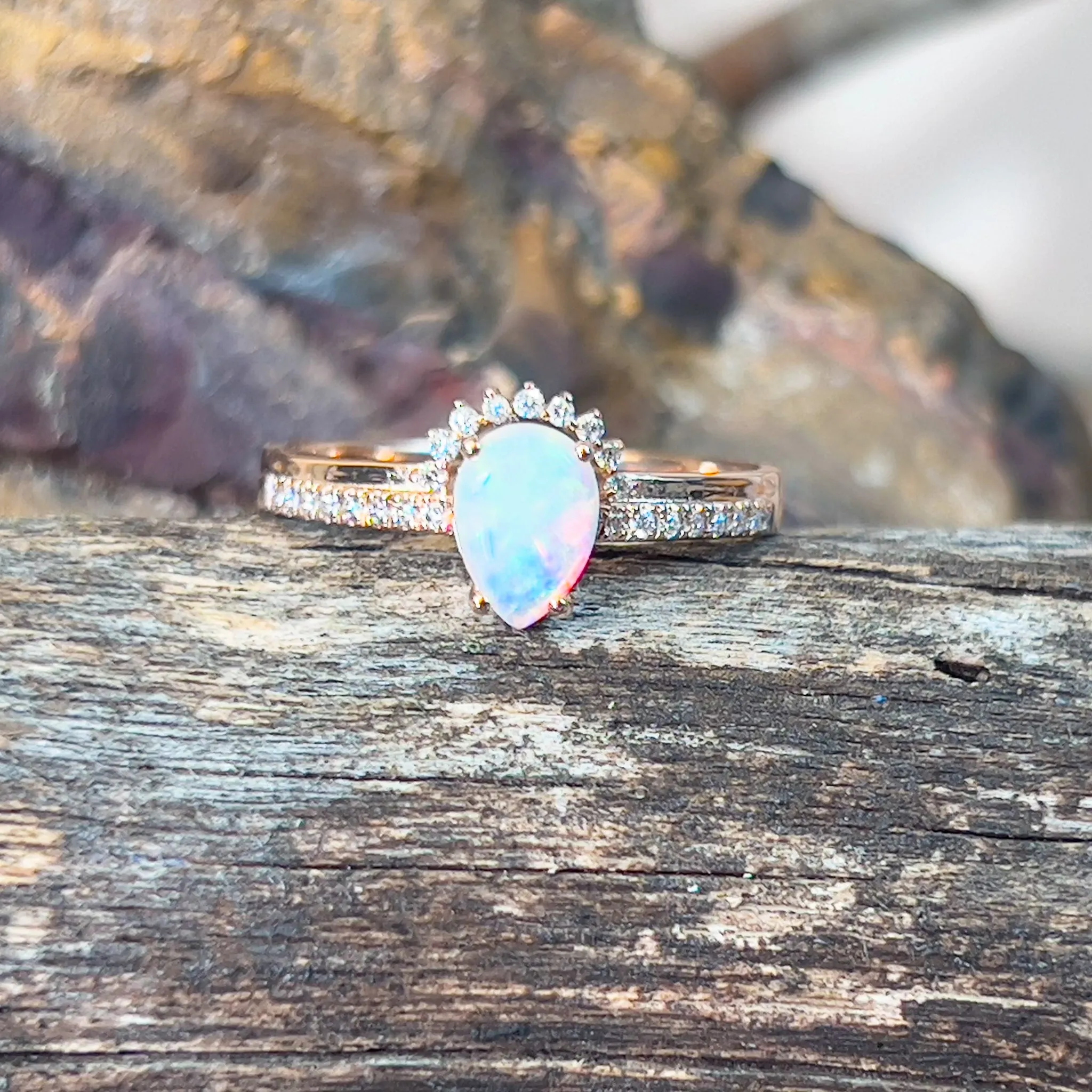 14kt Rose Gold pear shape Opal and diamond ring